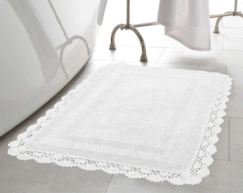 Laura Ashley Absorbent Bath Mat Reversible Crochet Soft and Plush Bathroom Mat 100% Cotton 21x34 Bath Rug, White - Image 1